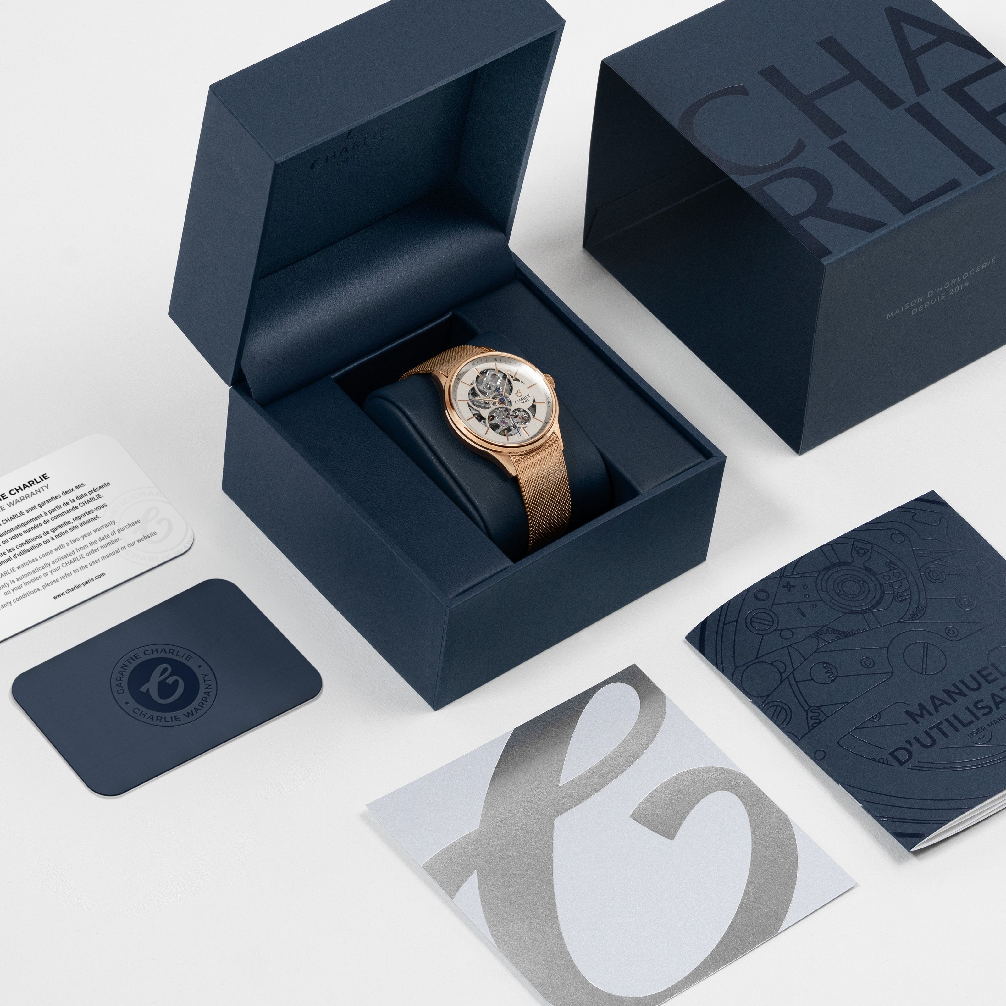 INITIAL 36 - Automatique Ajourée - Doré rose/Bleu Montres CHARLIE