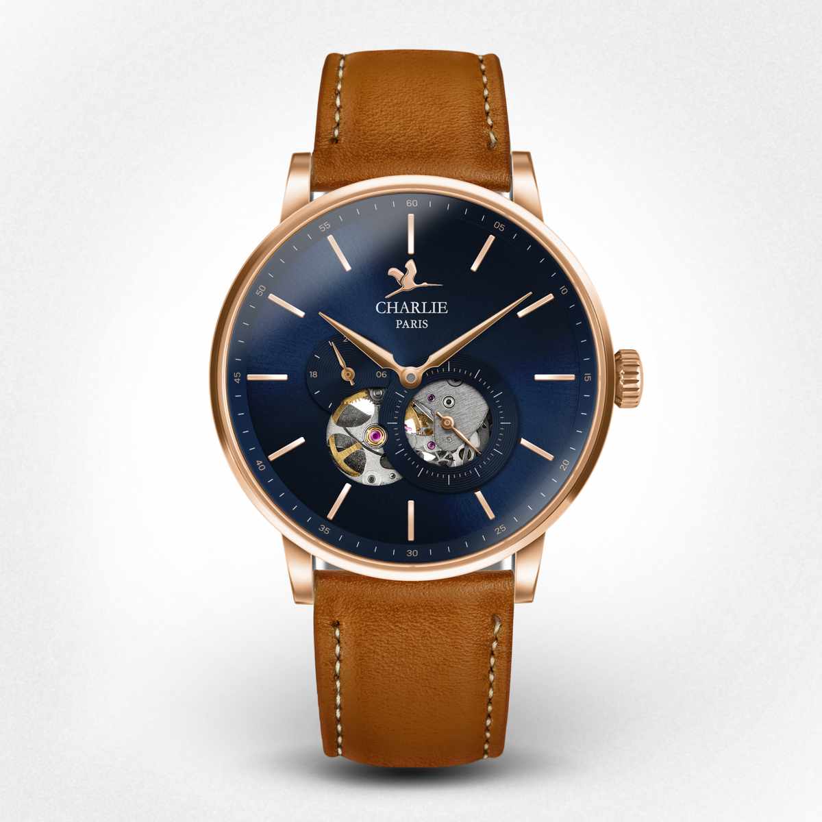 Rose gold watch with blue clearance strap